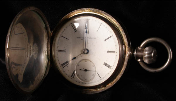 Silver-cased pocket watch