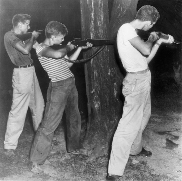 Three young ex-servicemen firing at the jail in Athens, Tennessee, 1946