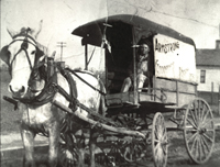 Armstrong Groceries delivery wagon in Etowah