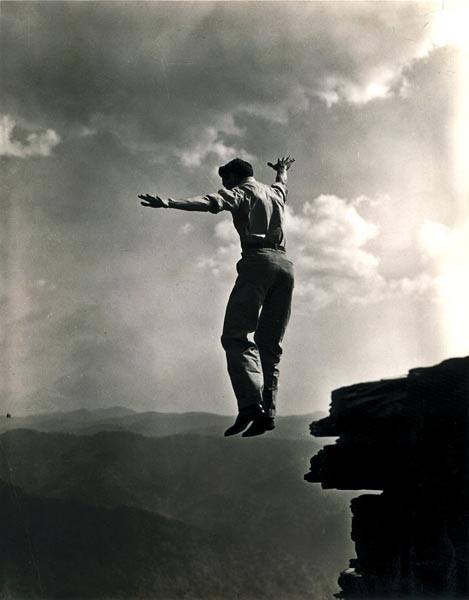Jumping off a small rock outcropping on Mt. LeConte