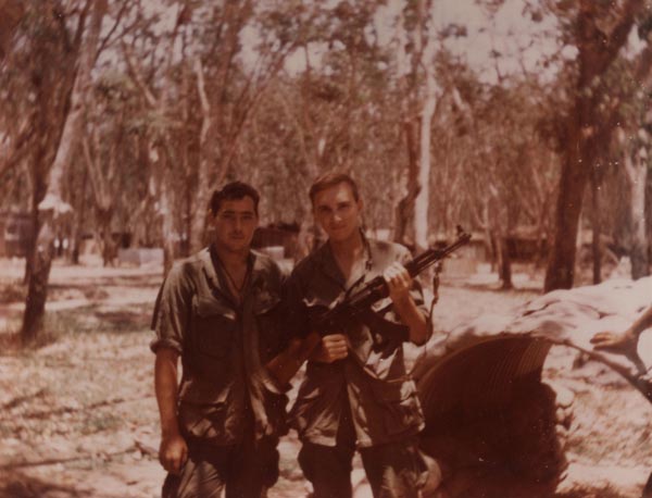Christopher Ammons holding captured AK-47